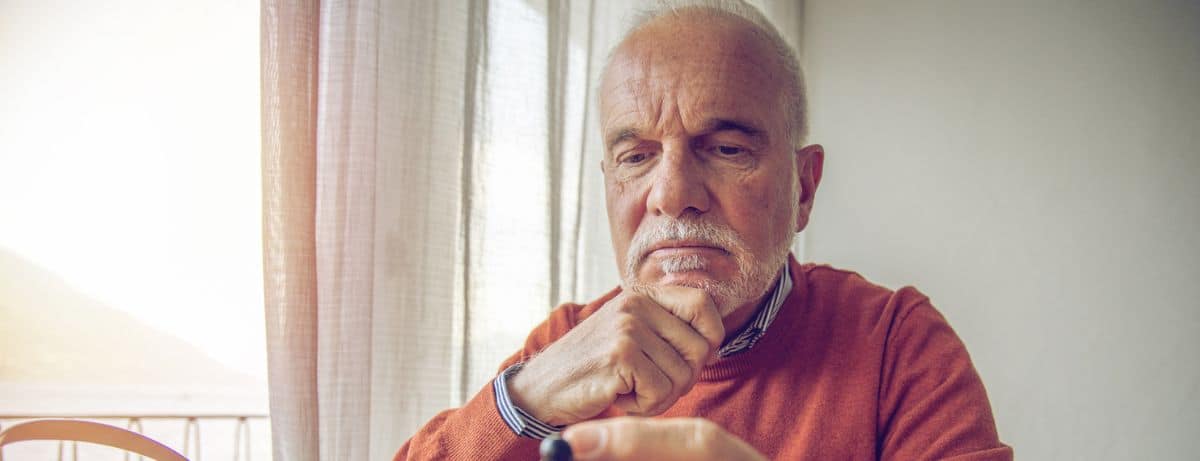 man adding cbd to tea